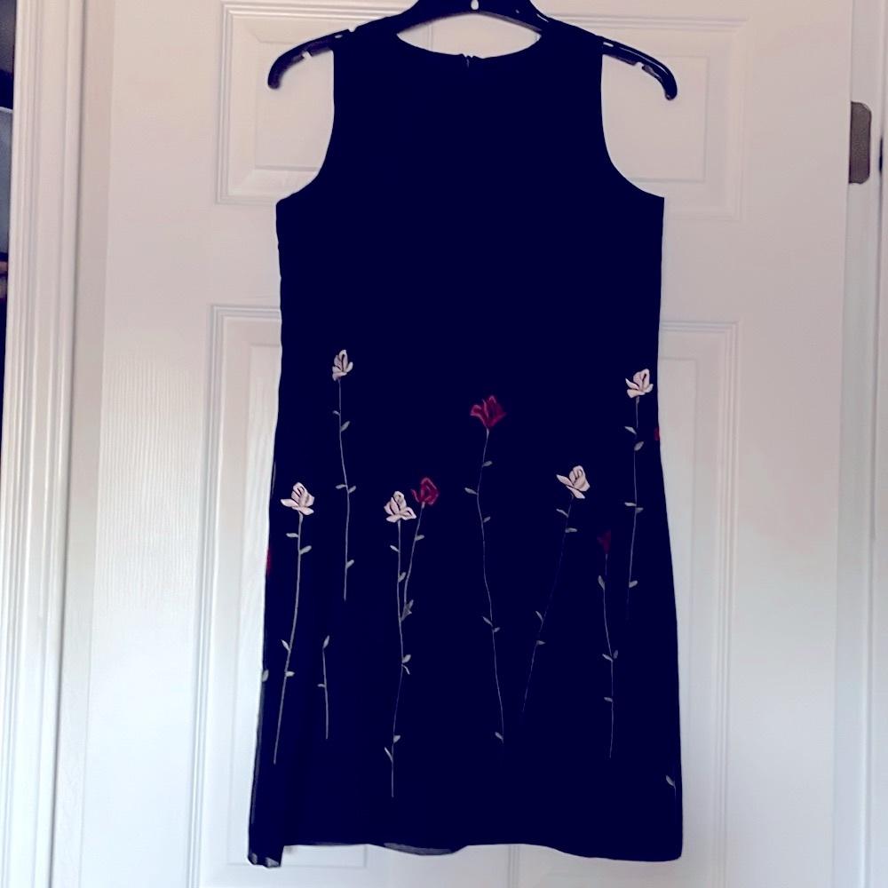 Black dress with red and pink embroidered flowers